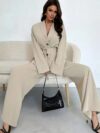 The Newness Milan Tie Waist Blazer Set a chic two piece outfit featuring a tailored blazer and matching pants cinched at the waist for a flattering silhouette Perfect for work or weekend