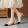 Womens black fabric stiletto heel pumps with a gold ankle strap