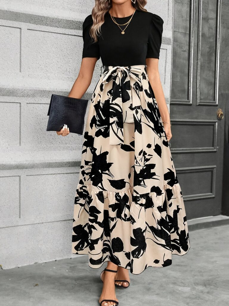 Model wearing the Newness Timeless Chic Print Midi Dress, a versatile and stylish midi dress perfect for any occasion.