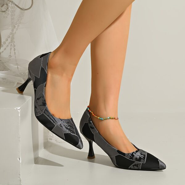 Newness Rock Chic Pointed Toe Stilettos: Edgy pointed-toe stilettos in black leather, showcasing lightweight comfort and a sleek silhouette.