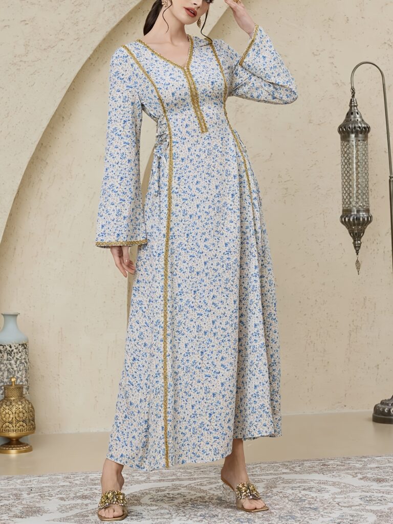 Azure Dream Elegant Blue Floral A-Line Dress: Stunning long-sleeved dress with a round neck, golden belt, and elegant blue floral pattern, perfect for weddings and formal events.
