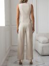 Model wearing Newness Effortless Chic Sleeveless Jumpsuit a versatile and stylish jumpsuit perfect for any occasion