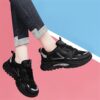 Newness Cityscape Casual Sport Sneakers showcasing all season comfort and a chic modern design The sneakers are shown on a models feet highlighting the style and detailing