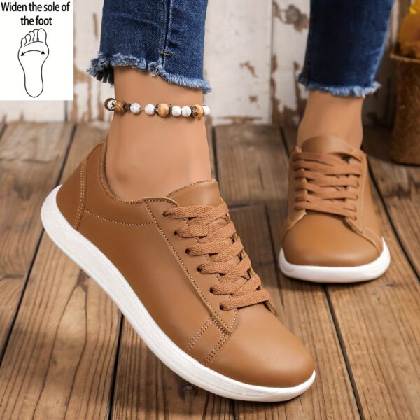 Newness Cloud Comfort Wide Fit Sneakers White sneakers with breathable lining and EVA sole showcasing their wide fit design for ultimate comfort