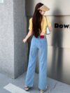 Glacier blue embroidered wide leg jeans from Newness showcasing intricate embroidery and a flattering wide leg silhouette