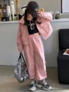 Girl wearing a stylish hooded suit perfect for spring Dubai inspired design
