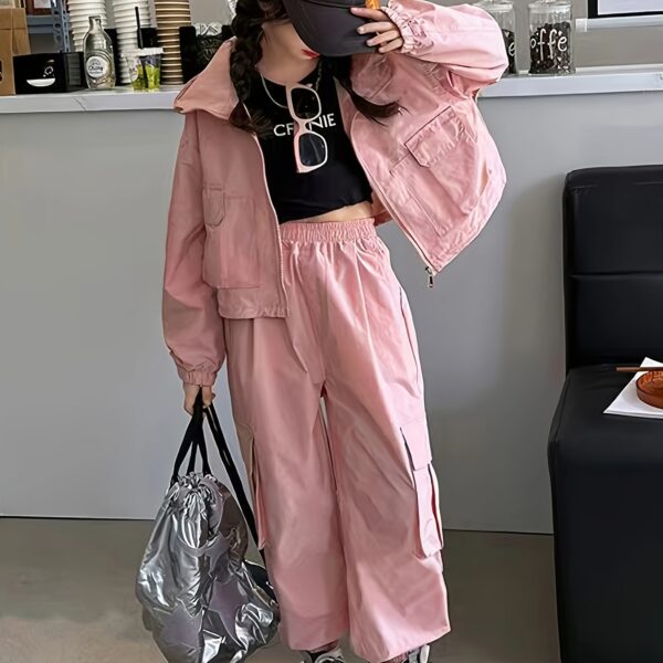 Girl wearing a stylish hooded suit perfect for spring Dubai inspired design