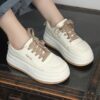 Newness white thick sole sneakers Chic comfortable and effortlessly cool footwear for everyday wear