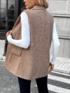 Newness City Chic Houndstooth Sleeveless Suit Jacket A stylish houndstooth sleeveless jacket perfect for layering over dresses or blouses during FallWinter Versatile and chic