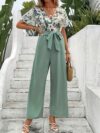 Escape to Paradise Floral Vacation Outfit A chic and comfortable floral outfit perfect for spring getaways Model shown wearing the complete outfit including mention specific items like dress shorts top etc showcasing its breezy and stylish design