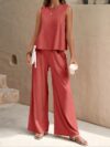 The Newness Cairo Sleeveless Wide Leg Set in white featuring a relaxed sleeveless top and wide leg pants perfect for a spring or summer day