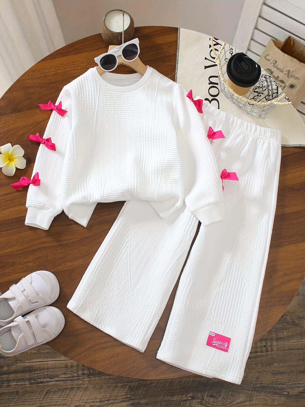 Adorable girls two piece autumn outfit cozy knit top and loose fitting pants perfect for fall adventures Dubai design