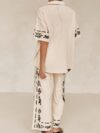 Effortlessly chic Botanical Breeze Floral Print Set from Newness A soft polyester blend creates a relaxed all season outfit Flattering floral print