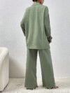 Model wearing the Newness Dubai Nights Off Shoulder Pants Set a luxurious polyester two piece outfit featuring an off shoulder top and wide leg pants perfect for evening events