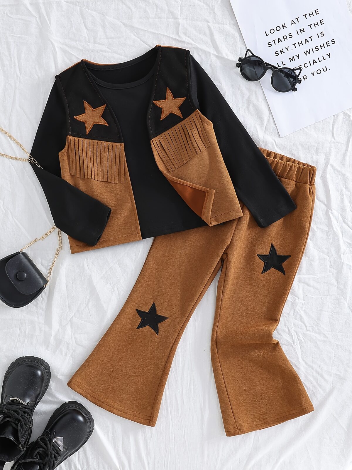 Adorable girl twirling in the Newness Starlight Dreams Girls Western Set showcasing its sparkly details and stylish western design Perfect for parties or playtime