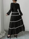 Effortlessly chic Casablanca Tiered Maxi Skirt Set from Newness Model showcasing the complete set featuring a flowing maxi skirt with tiers and a coordinating top