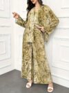 Model showcasing the Newness Effortless Chic Tie Dye Pantsuit a stylish spring ensemble featuring a vibrant tie dye pattern on both the pants and matching blazer The pantsuit exudes effortless sophistication and chic style