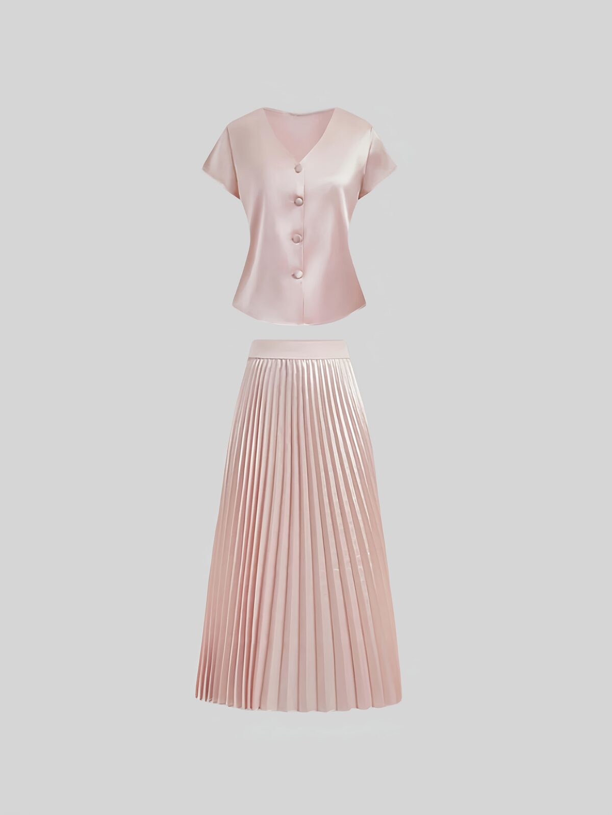 Flatlay of the Newness Bisous Rosé pink pleated midi set showcasing the skirt and top separately and together The set is a beautiful shade of pink and features delicate pleats