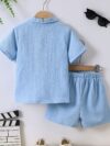 Adorable boy playing outdoors wearing the Newness Summer Breeze Boys Casual Short Set The set is comfortable and perfect for playtime