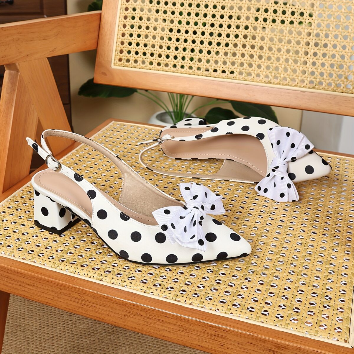 Classic black and white polka dot pumps from Newness perfect for adding a retro touch to any outfit