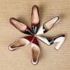 Newness Metropolitan Pointed Block Heel Pumps Chic black pumps with a pointed toe and comfortable block heel perfect for any occasion