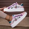 Newness Pastel Dream Butterfly Print Sneakers Chic and comfy pastel sneakers with a beautiful butterfly print perfect for spring