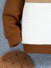 Stylish boys two piece outfit featuring a comfortable long sleeved knit pullover and trendy cargo pants perfect for spring and fall adventures