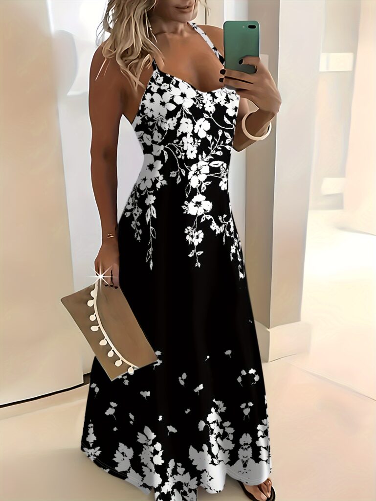 Effortlessly chic black and white floral print maxi dress, perfect for summer vacations or casual outings.
