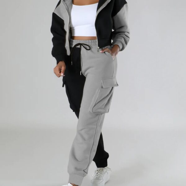 Model wearing the Newness Milan Color Block Tracksuit, showcasing its comfortable fit and modern color blocking design.