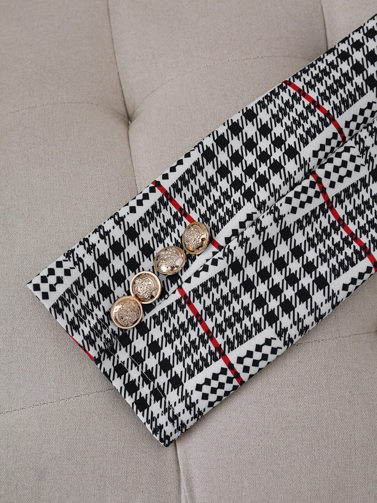 Model showcasing the Newness Kensington Plaid Skirt Set a chic and modern take on the classic plaid skirt set Featuring a stylishly tailored skirt and coordinating top