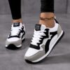Newness City Stroll Striped Casual Sneakers Effortlessly stylish striped sneakers perfect for all day wear Image shows the sneakers from a side angle highlighting their comfortable design and vibrant stripes