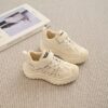 Stylish beige and white Active Ace Kids breathable casual sneakers with soft EVA sole and A branding perfect for boys and girls aged 14 and under