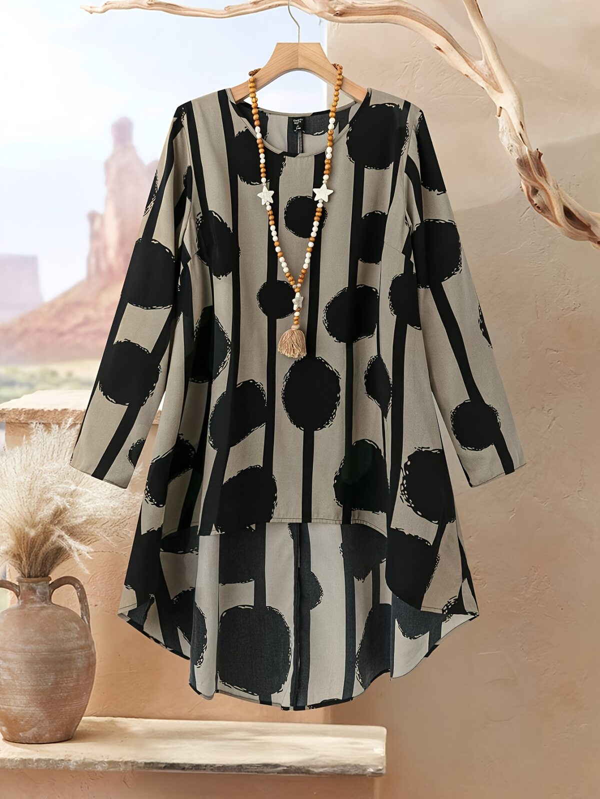 Cairo Chic Geometric Print Suit by Newness A stylish and modern geometric print suit perfect for spring and summer