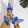 Newness Printed Mary Jane Pumps with Bow Embellishment Chic and comfortable pumps featuring a vibrant print and delicate bow detail perfect for any occasion
