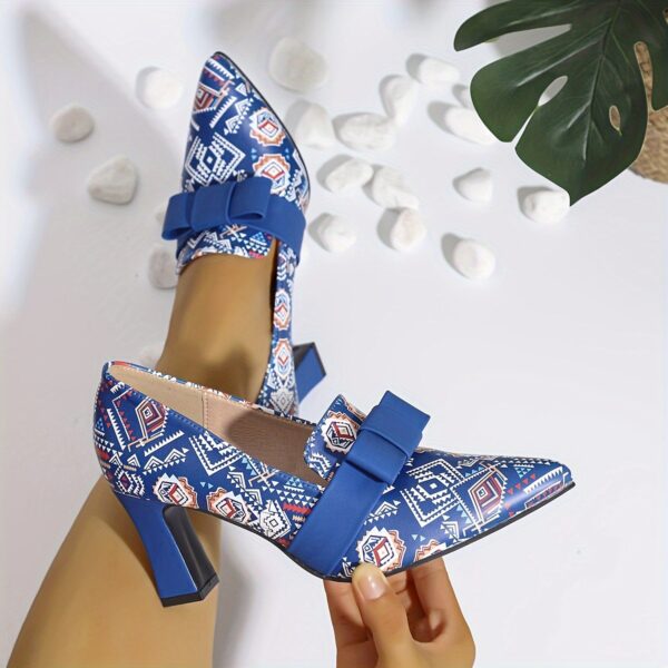 Newness Printed Mary Jane Pumps with Bow Embellishment Chic and comfortable pumps featuring a vibrant print and delicate bow detail perfect for any occasion