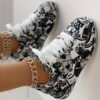 Newness Street Chic Graffiti Print Sneakers Elevate your street style with these chic comfortable and durable sneakers featuring a bold graffiti print