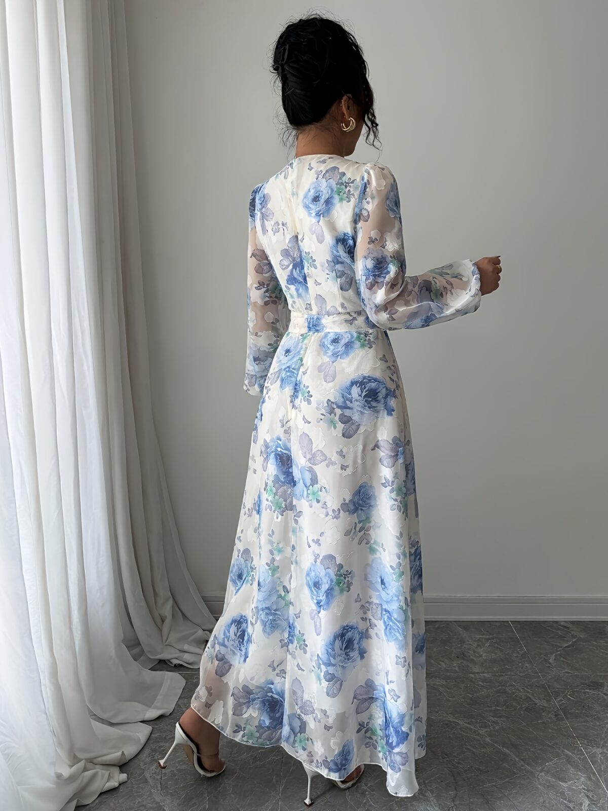 Effortlessly elegant Azure Bloom floral print maxi dress perfect for spring and autumn Features a chic print and flattering silhouette