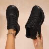 Newness Elevated Comfort Chunky Platform Sneakers A stylish close up showcasing the platform sole detailing and arch support