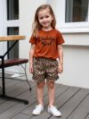 Adorable little girls summer outfit featuring a chic leopard print and a playful Daddys Girl graphic