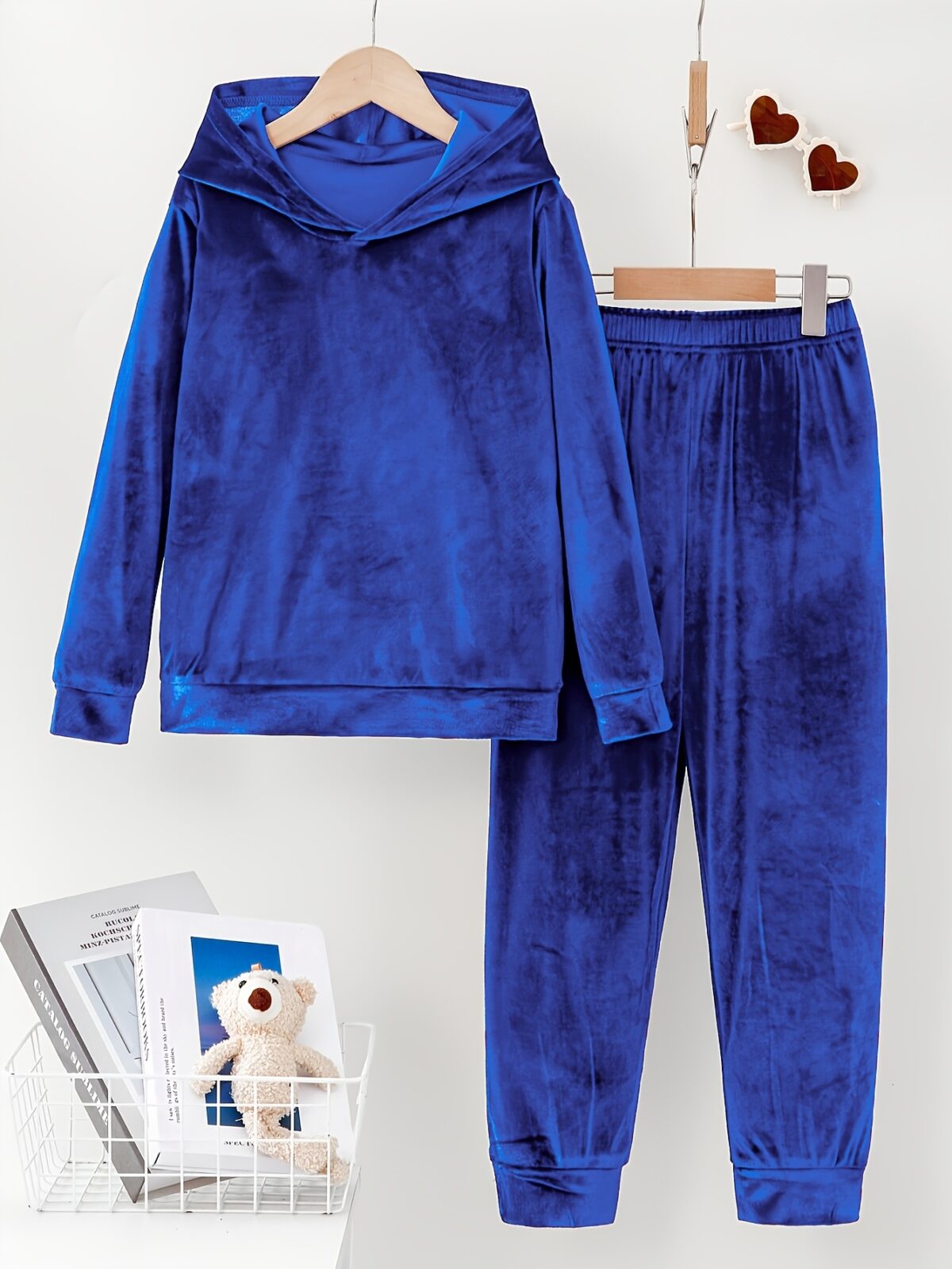 Indulge in ultimate comfort with the Newness Luxe Lounge Velvet Hooded Set This luxurious loungewear set features a plush velvet fabric and a flattering hooded design perfect for relaxing at home or running errands in effortless style