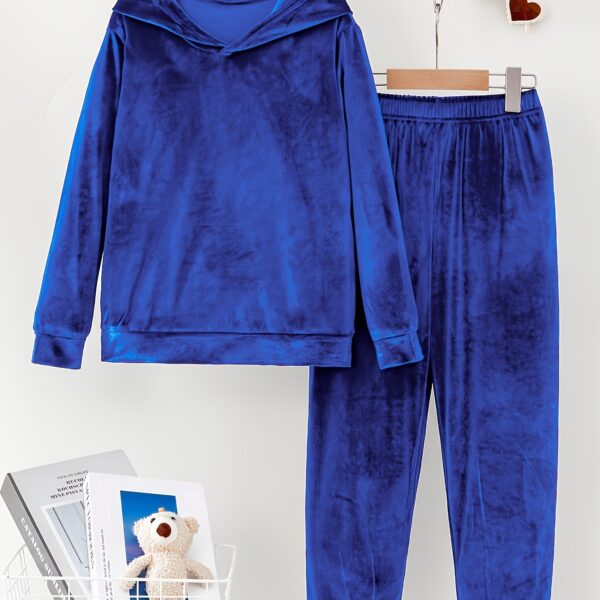 Indulge in ultimate comfort with the Newness Luxe Lounge Velvet Hooded Set. This luxurious loungewear set features a plush velvet fabric and a flattering hooded design, perfect for relaxing at home or running errands in effortless style.