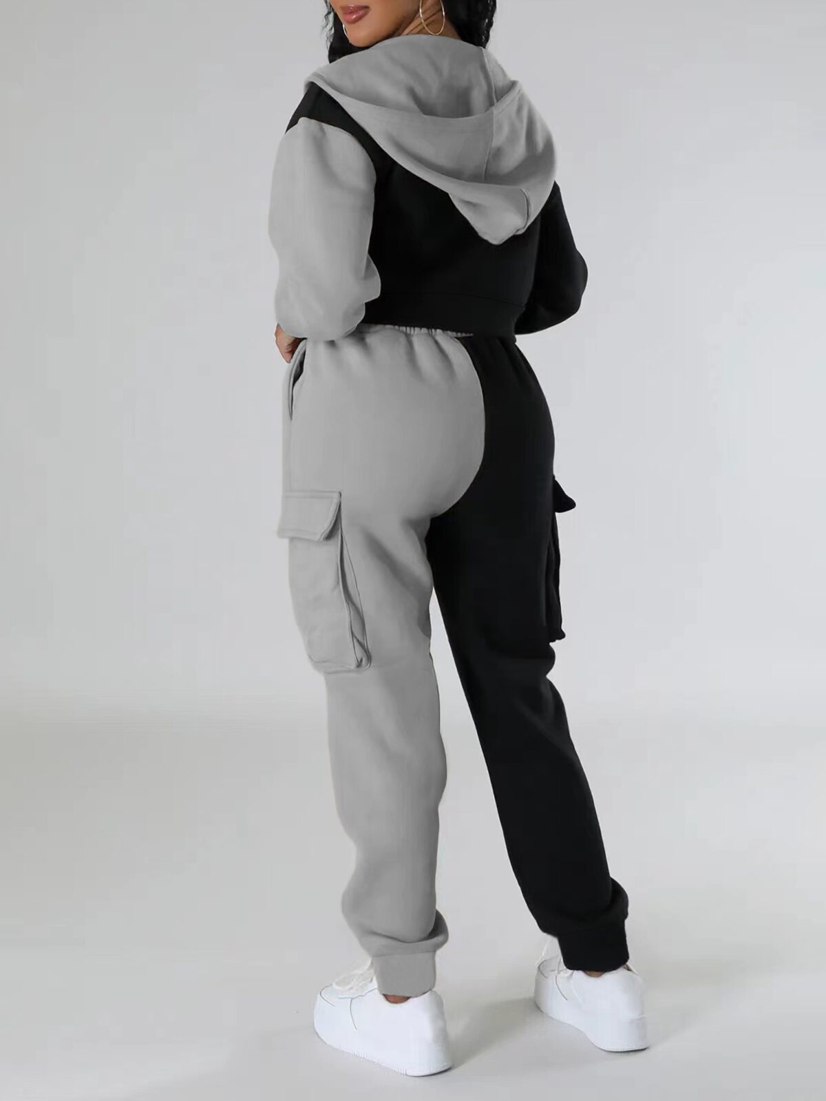 Model wearing the Newness Milan Color Block Tracksuit showcasing its comfortable fit and modern color blocking design