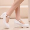 Newness Noir Glossy Mary Jane Mules Chic modern and undeniably elegant black patent leather shoes with a Mary Jane strap