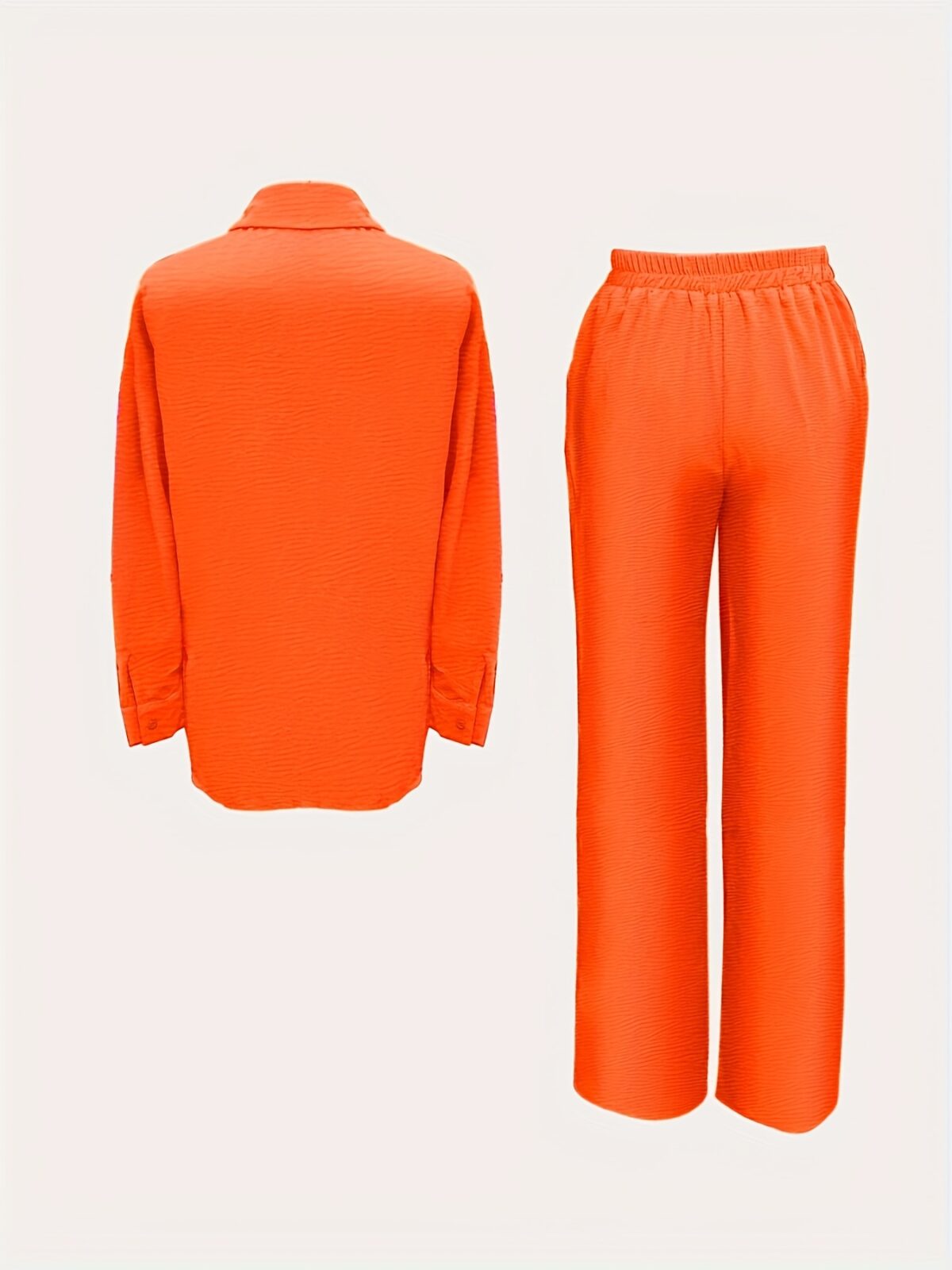 Model wearing a vibrant wide leg pants set perfect for spring The set features a flowy comfortable fit in a breathable polyester fabric