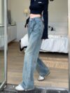 Santorini Vintage Wide Leg Jeans in a flattering wide leg style made from premium denim Shown in a stylish setting