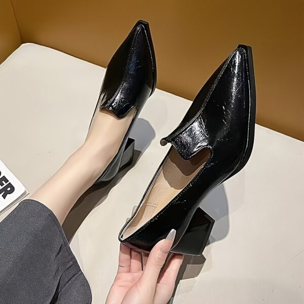 Newness The Chelsea Modern Block Heel Pumps in black showcasing the elegant silhouette and comfortable block heel Perfect for any occasion
