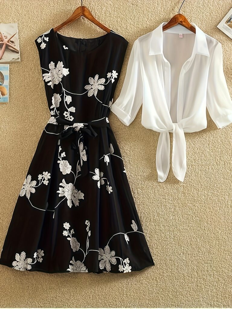 Model wearing the Newness Summer Solstice Floral Print Dress, a chic and flattering midi dress with a retro-inspired floral print, perfect for summer.