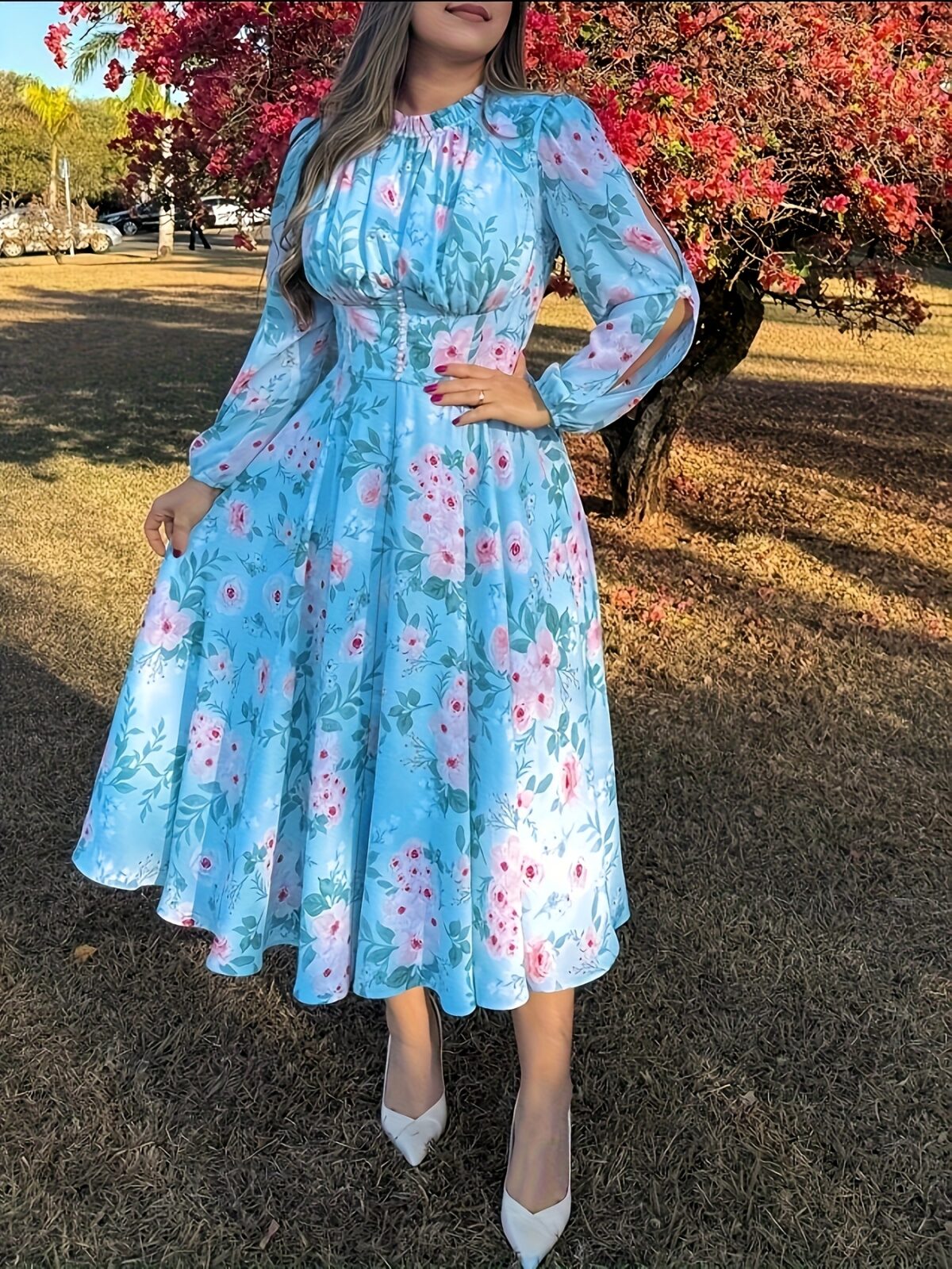 Embrace Parisian chic in the Newness Azure Bloom Floral Print Dress This stunning summer dress features a vibrant floral print