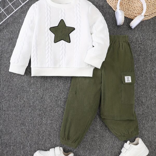 Adorable boy modeling the Newness Cozy Comrade 2 Piece Set featuring a beige star embroidered sweatshirt and matching corduroy cargo pants Perfect for fall and winter