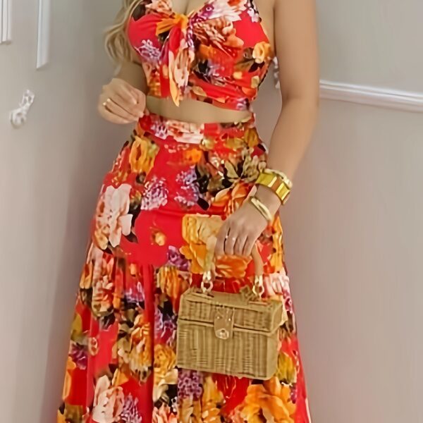 Model wearing the Newness Dubai Nights Tropical Print Suit a chic and effortless summer outfit perfect for a getaway The suit features a vibrant tropical print